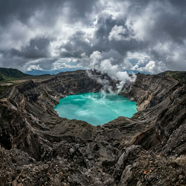 Volcanic crater lake with turquoise water